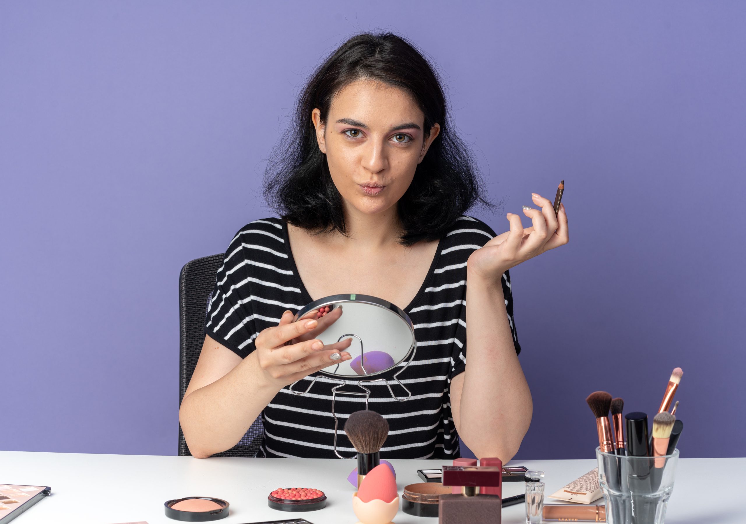 A collection of modern and aesthetically pleasing D2C beauty products, like serums and moisturizers, arranged on a clean background.