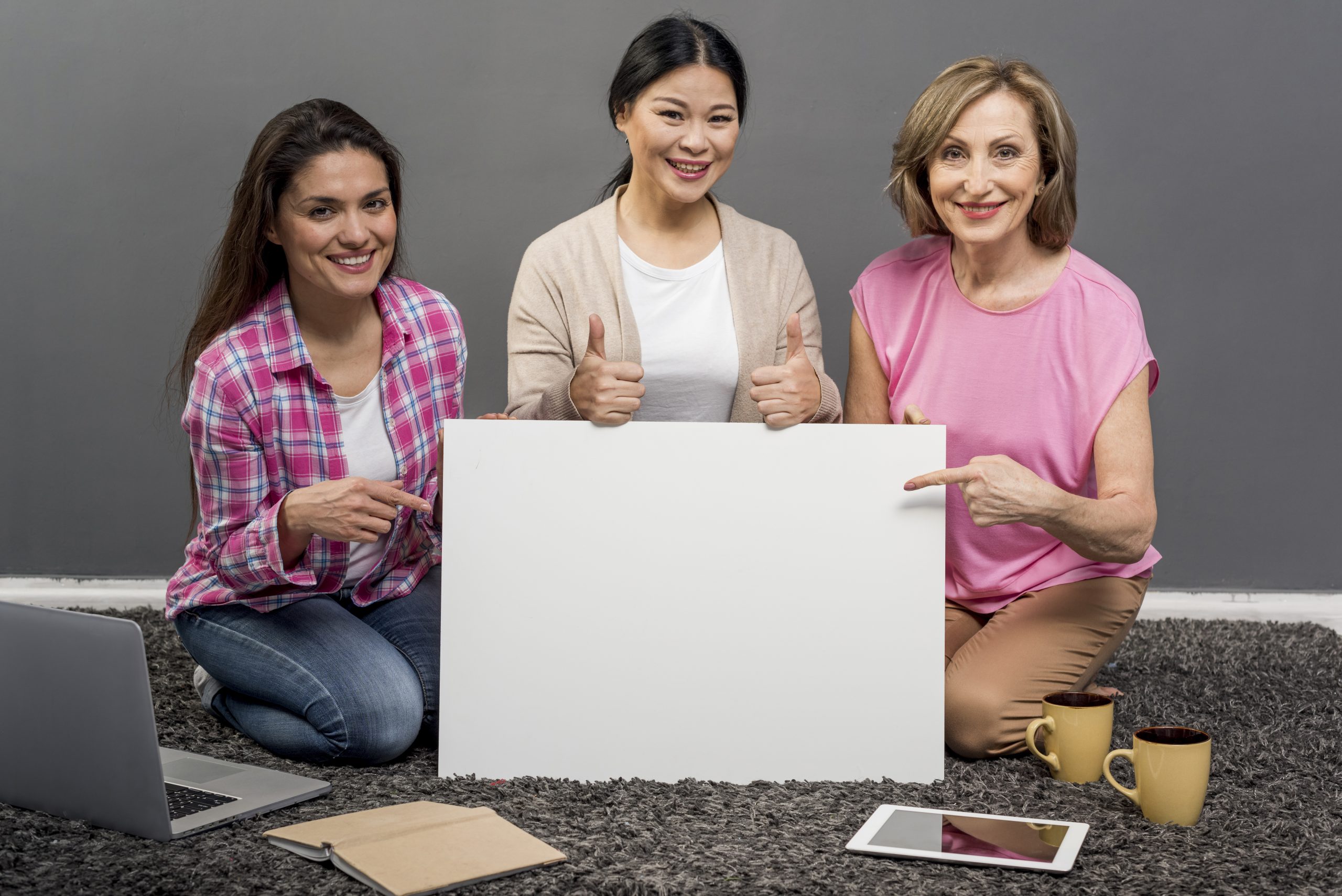 A large, bright digital billboard advertising a product at a busy city intersection at night, showcasing the impact of DOOH.